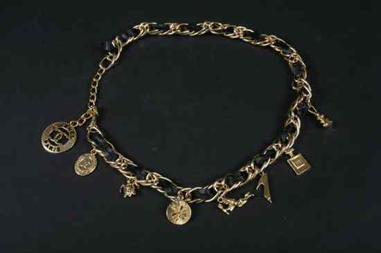 Appraisal: CHANEL GOLD-TONE CHAIN LINK AND BLACK LEATHER CHARM BELT Gold-tone