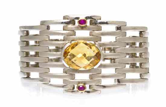 Appraisal: A Sterling Silver Citrine and Ruby Bracelet containing one oval