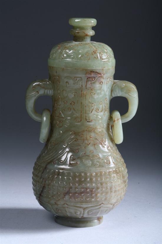 Appraisal: CHINESE JADE VASE WITH LID With rings on elephant head-form