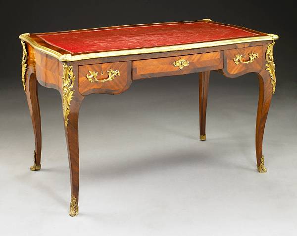 Appraisal: A Louis XV style gilt bronze mounted walnut bureau plat