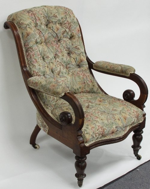 Appraisal: An early Victorian button upholstered armchair circa with open scroll