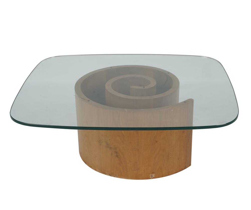 Appraisal: VLADIMIR KAGAN SNAIL COFFEE TABLEmolded walnut plywood and glass Condition