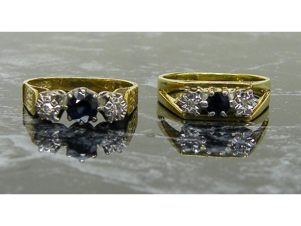 Appraisal: Two similar ct diamond and sapphire three stone rings gm