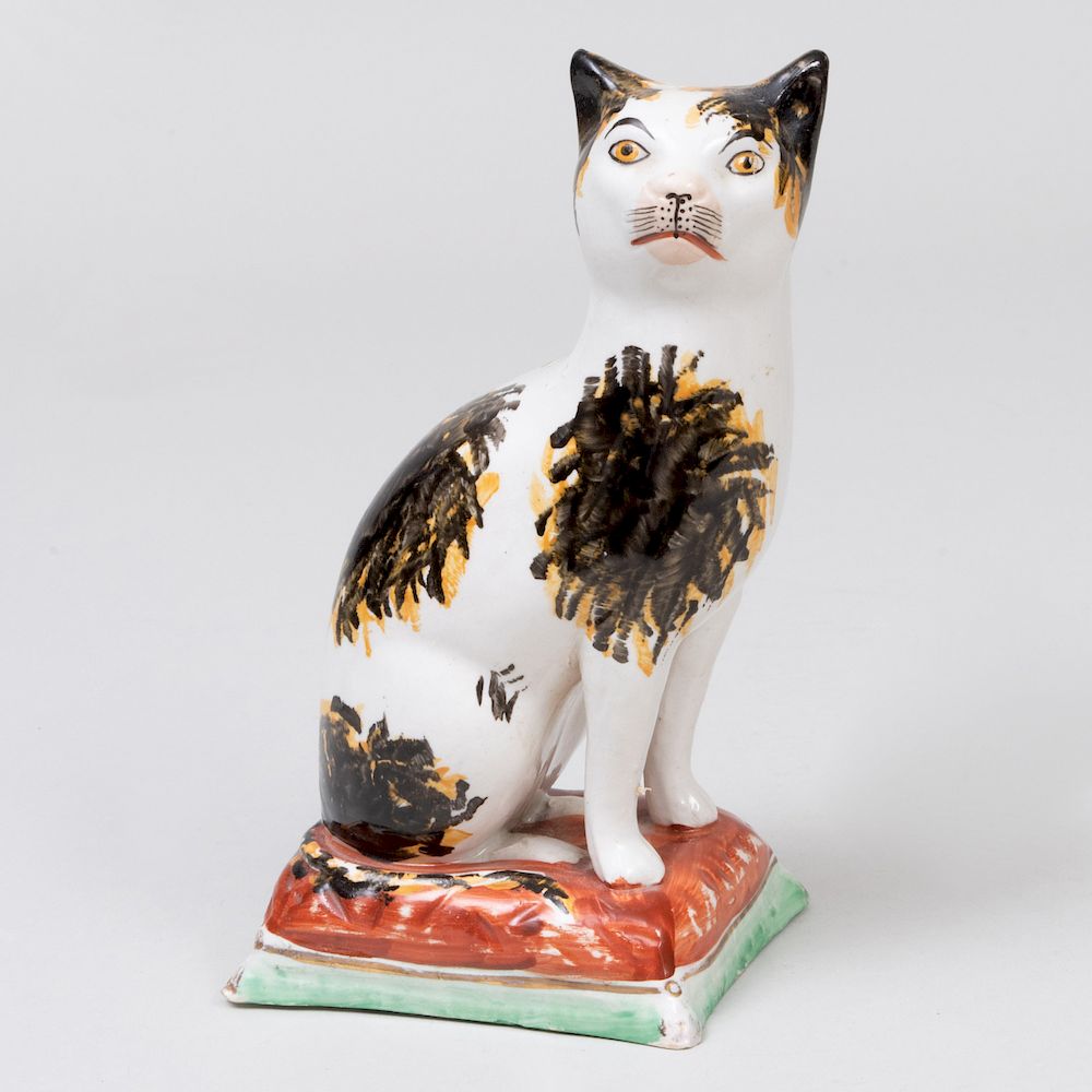 Appraisal: Staffordshire Creamware Model of a Cat in high Property from