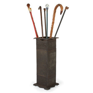 Appraisal: Seven Walking Sticks and a Cast Metal Umbrella Stand includes