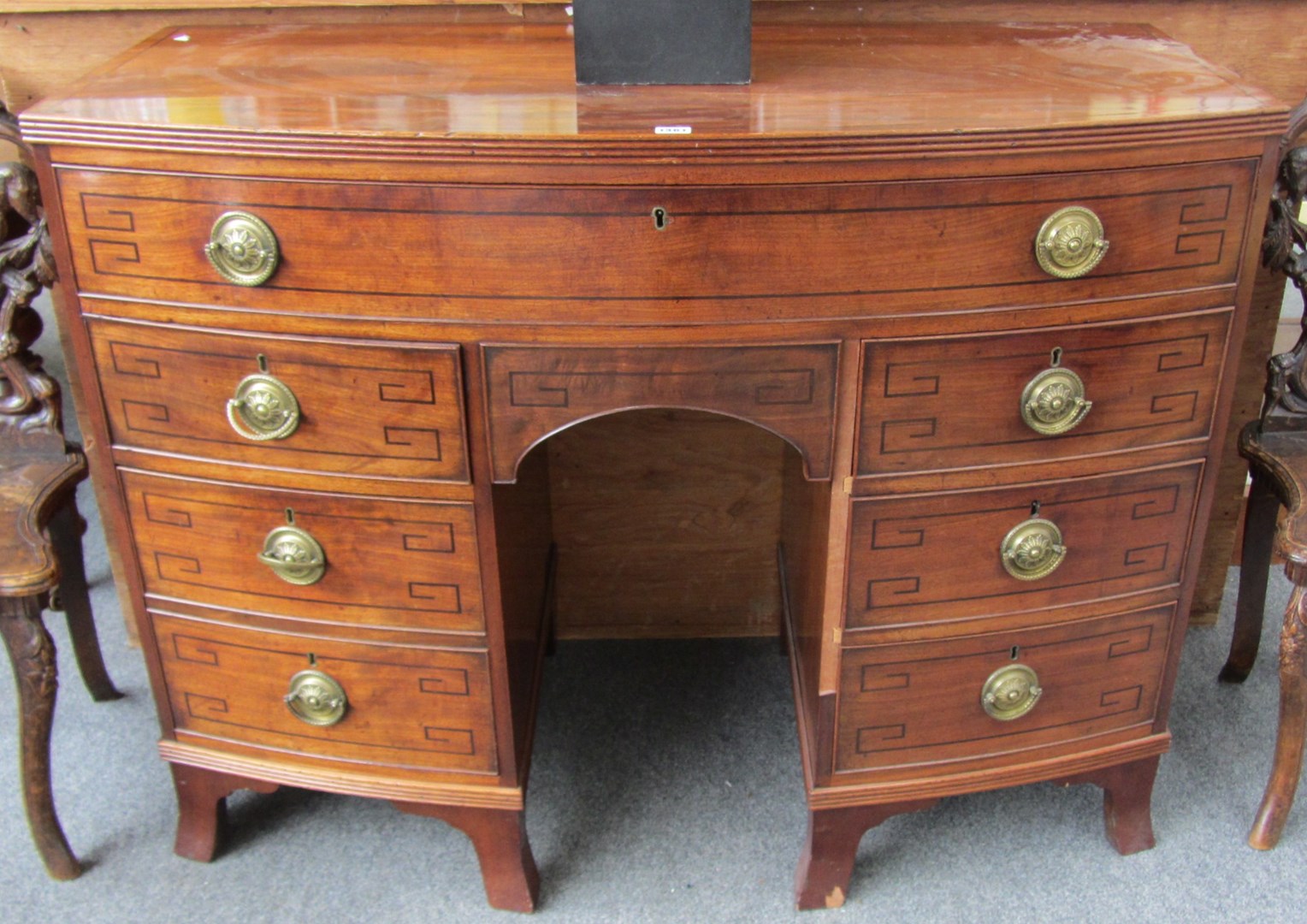 Appraisal: A Regency mahogany bowfront kneehole desk with four drawers one