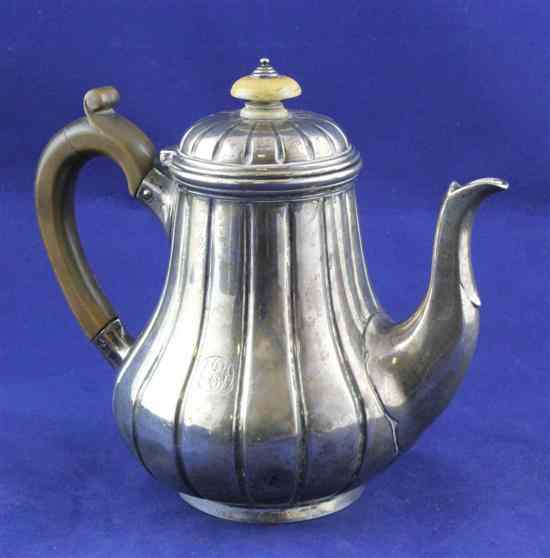 Appraisal: A Victorian silver bachelor's coffee pot by R S Garrard