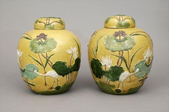 Appraisal: Pair of Chinese Yellow-Ground Porcelain Covered Jars Modern in in