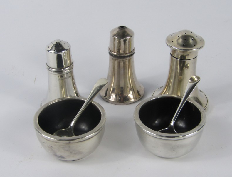 Appraisal: A pair of George V silver cased circular salts with