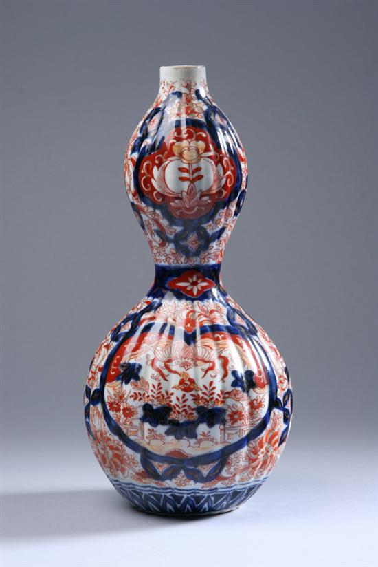 Appraisal: JAPANESE IMARI PORCELAIN DOUBLE GOURD VASE Meiji period Ribbed body