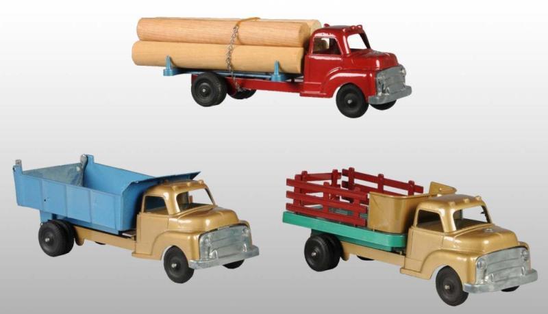 Appraisal: Lot of Cast Metal Structo Truck Toys Description s Includes