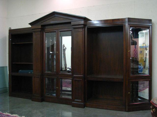 Appraisal: Seven Section Bookcase Curio Cabinet with mirrored back and beveled