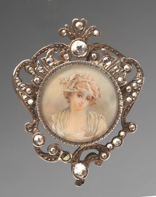 Appraisal: A CIRCULAR PORTRAIT MINIATURE of Elsie Agnew wearing a bonnet