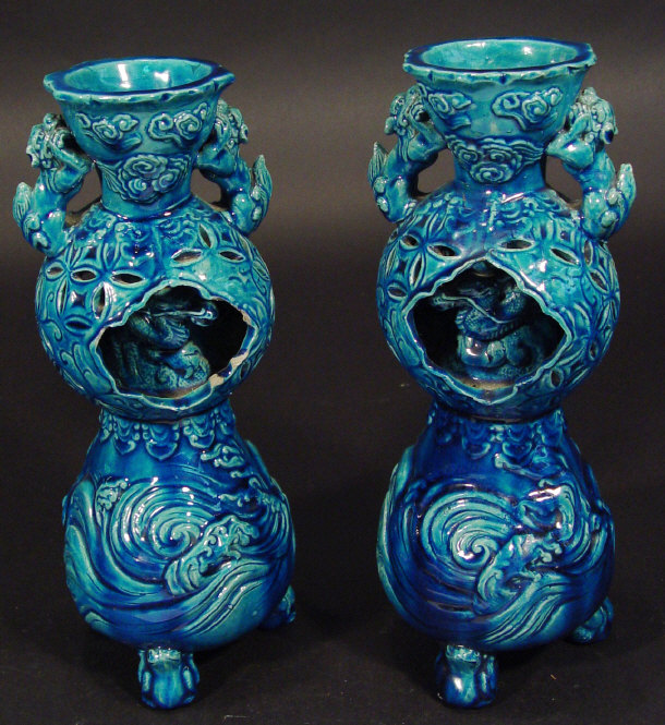 Appraisal: Pair of Chinese blue glazed stoneware vases relief moulded with