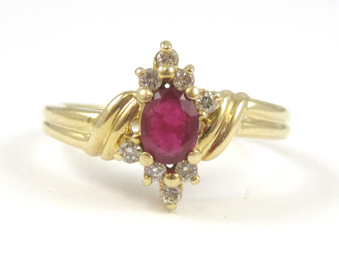 Appraisal: RUBY DIAMOND AND FOURTEEN KARAT GOLD RING with eight round-cut