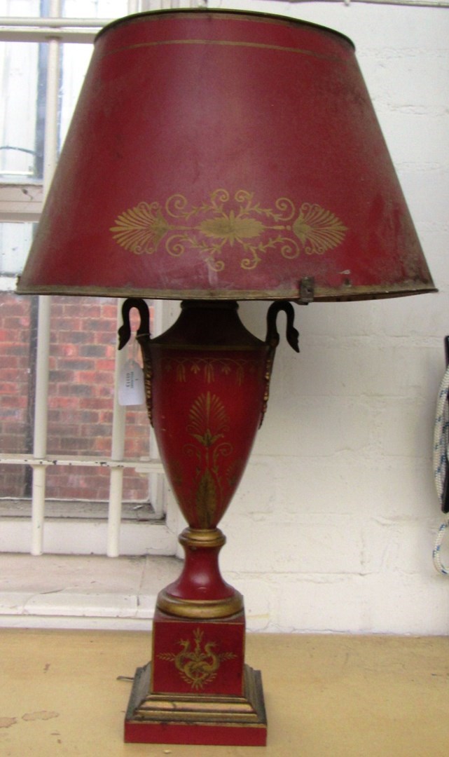 Appraisal: A tole peinte lamp base cast as a two handled