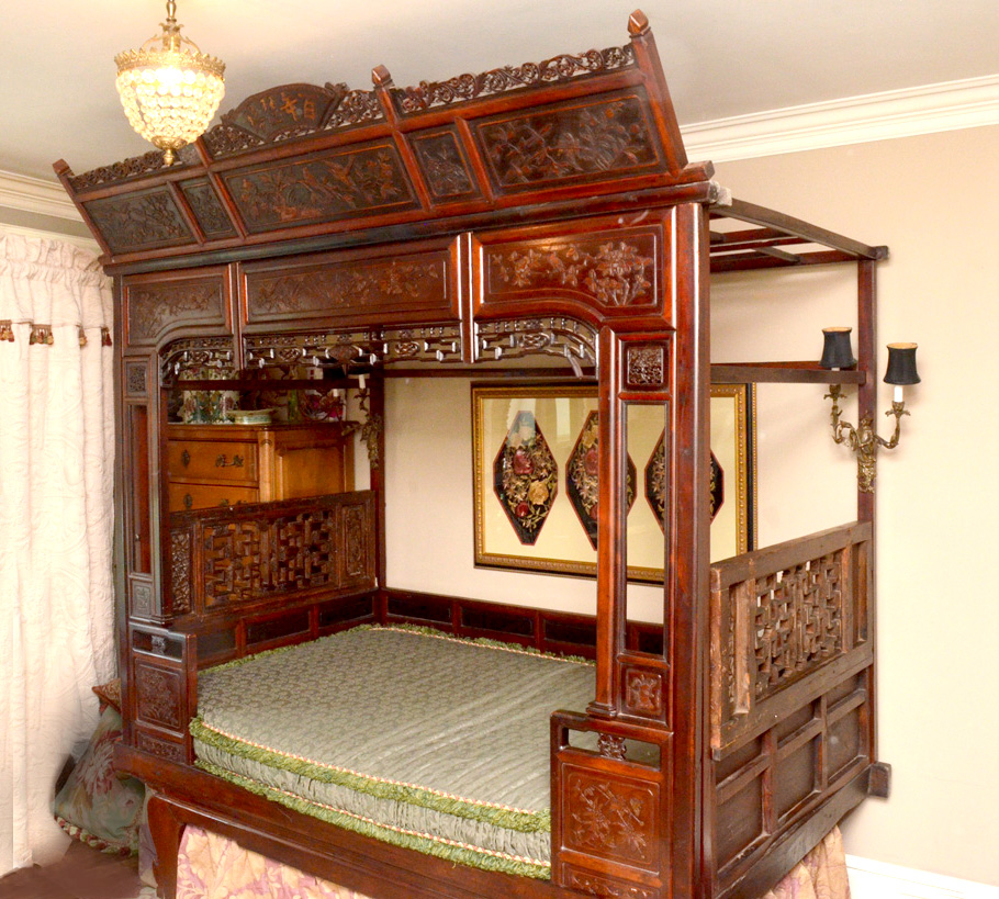 Appraisal: PROFUSELY CARVED CHINESE WEDDING BED Carved top and front with