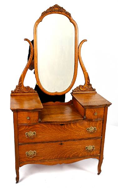 Appraisal: A Rococo style walnut dressing table height ft in width