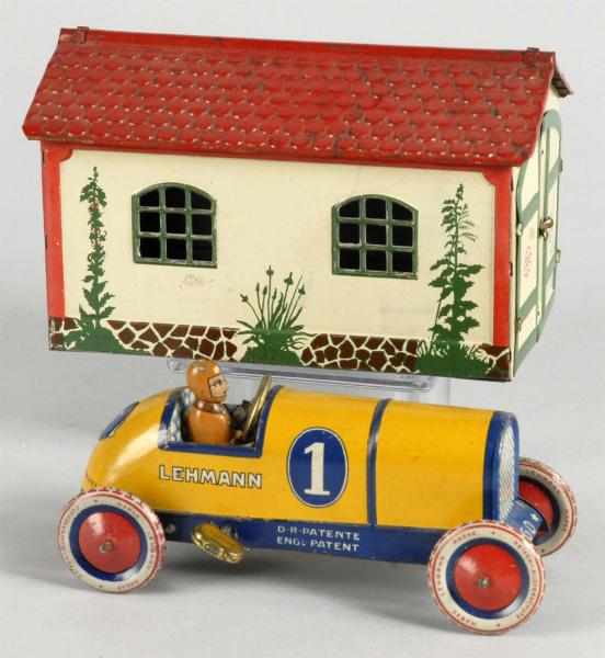 Appraisal: Tin Litho Lehmann Garage with Racer Wind-Up Toy Description German