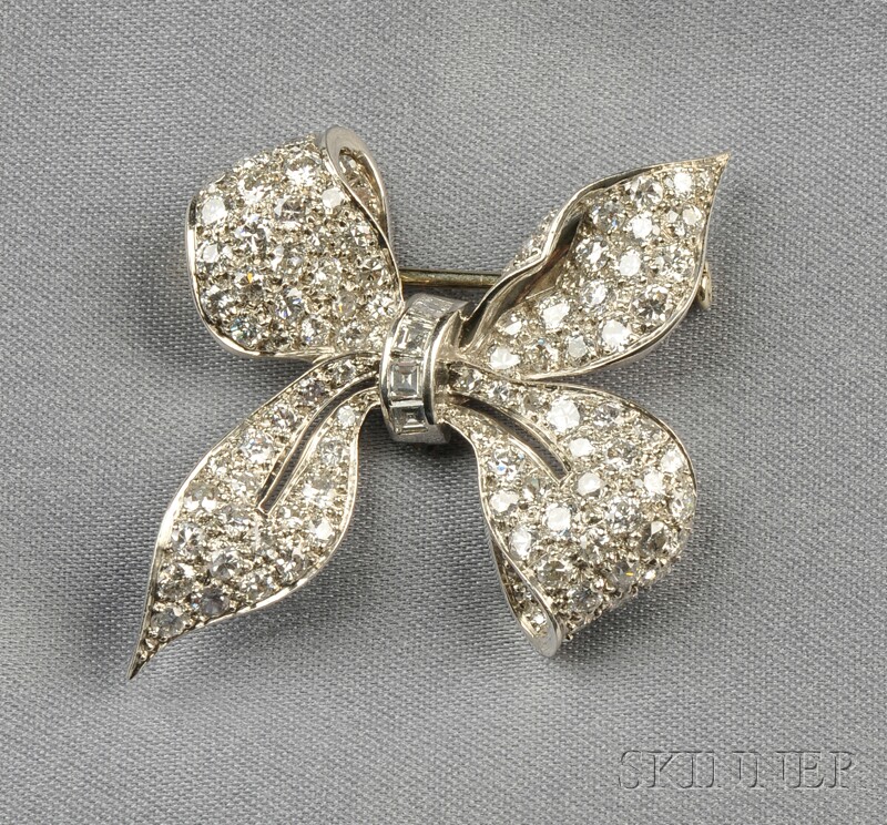 Appraisal: Platinum and Diamond Bow Brooch pave-set with full- and single-cut