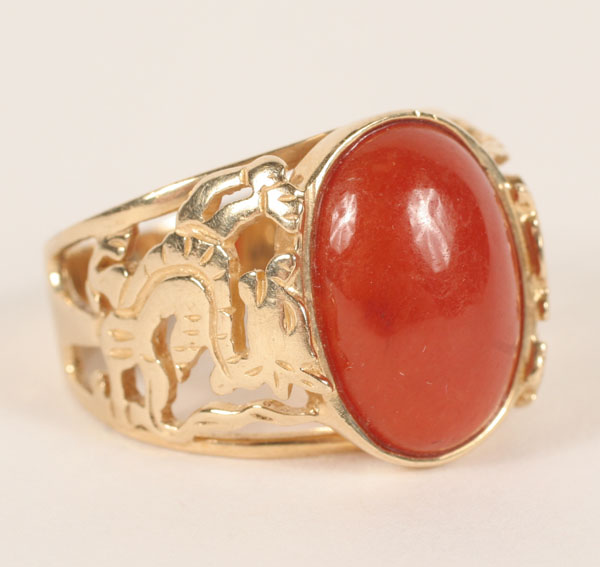 Appraisal: K yellow gold and red jade ring with dragon appliques