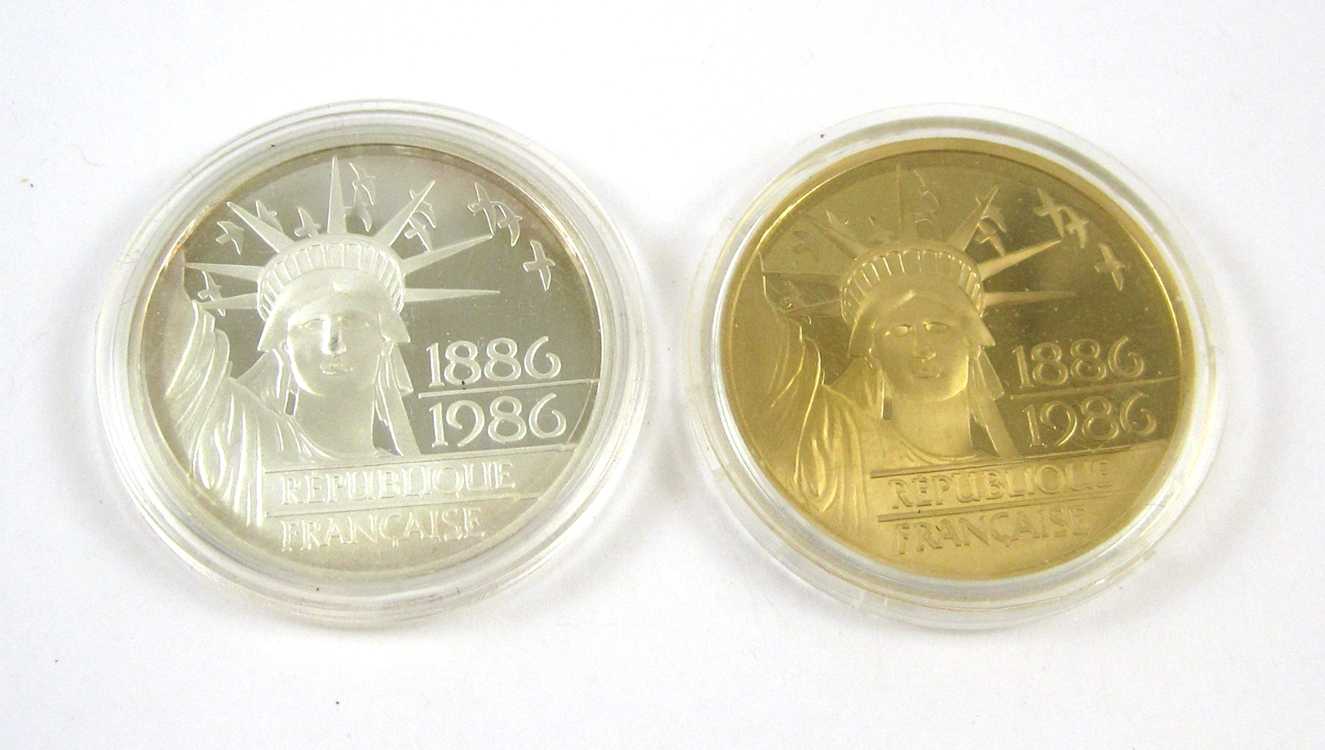 Appraisal: TWO FRENCH COMMEMORATIVE PROOF COINS IN ORIGINAL CASES GOLD Monnaie