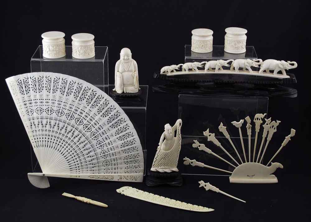 Appraisal: ESTATE COLLECTION OF CARVED IVORY To include Carved figure of