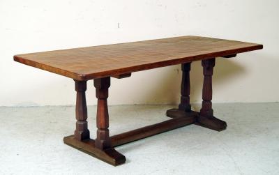 Appraisal: AN ADZED OAK REFECTORY TABLE by Robert Mouseman Thompson the