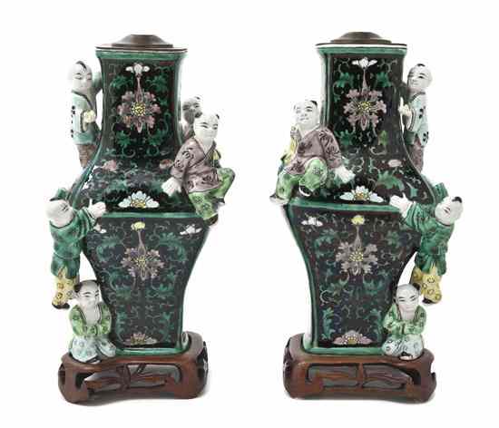 Appraisal: A Pair of Famille Noir Baluster Vases each with applied