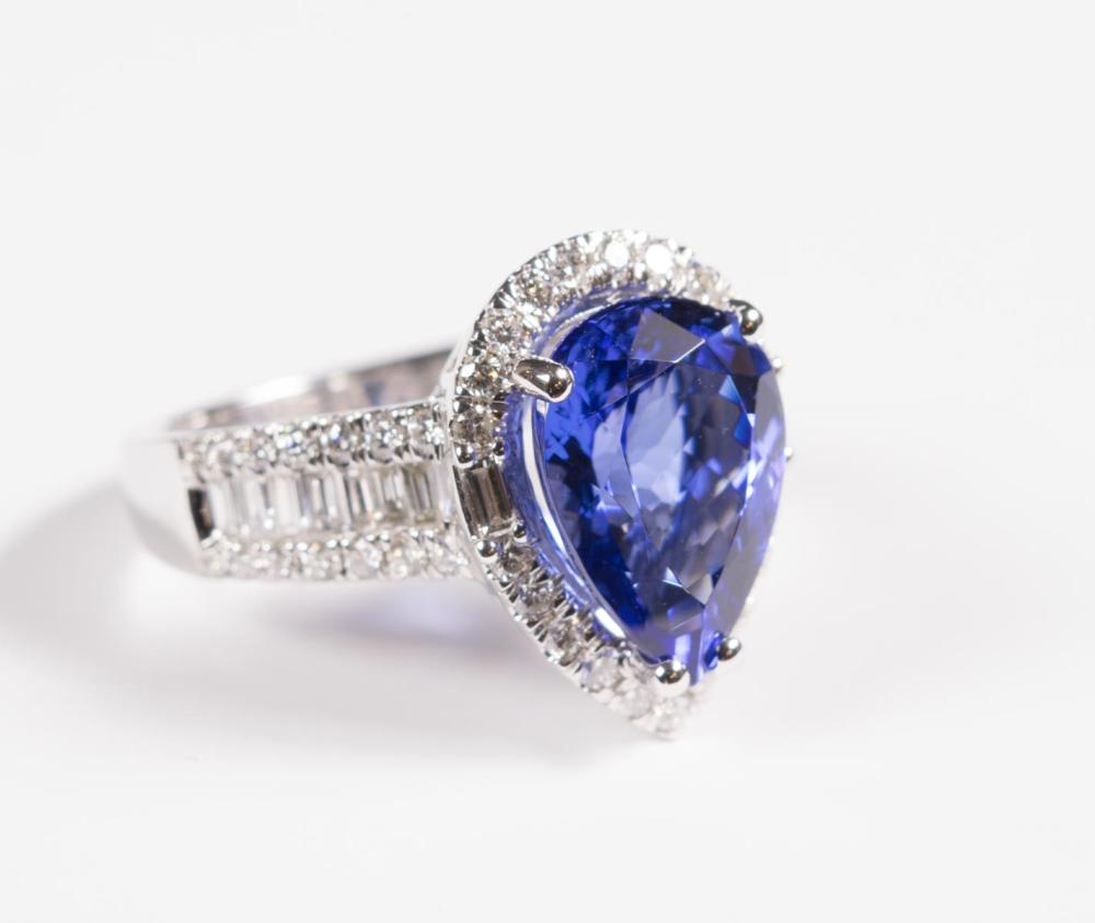 Appraisal: TANZANITE DIAMOND AND FOURTEEN KARAT WHITE GOLD RING with round-cut