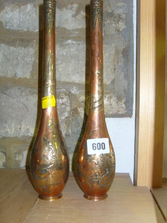 Appraisal: A pair of eastern copper and brass vases of ovoid