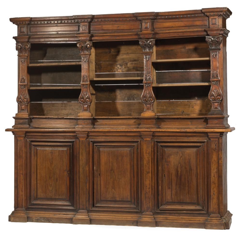 Appraisal: Italian Renaissance Carved Walnut Bookcase architectonic dentil molded cornice open