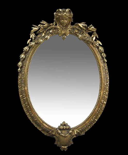 Appraisal: A Napoleon III carved giltwood and gesso oval mirror third