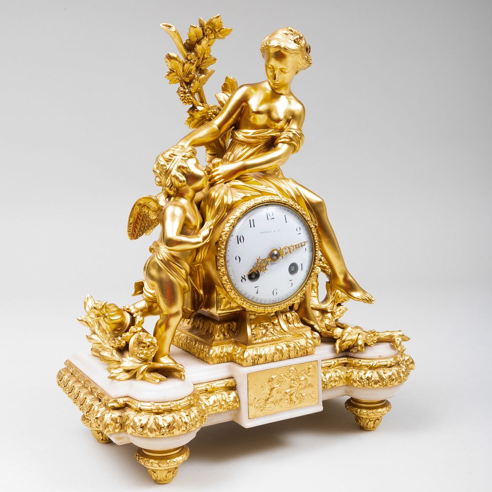 Appraisal: Tiffany Co Gilt-Bronze and Marble Cupid and Venus Mantel Clock