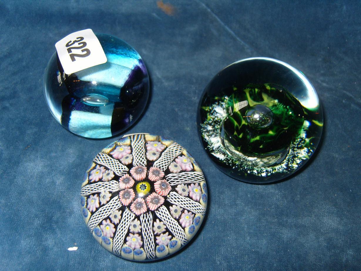 Appraisal: A collection of three glass paperweights including a Millefiori glass