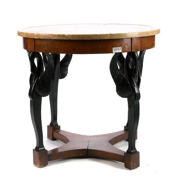 Appraisal: An Empire style ebonized and marble topped table height in