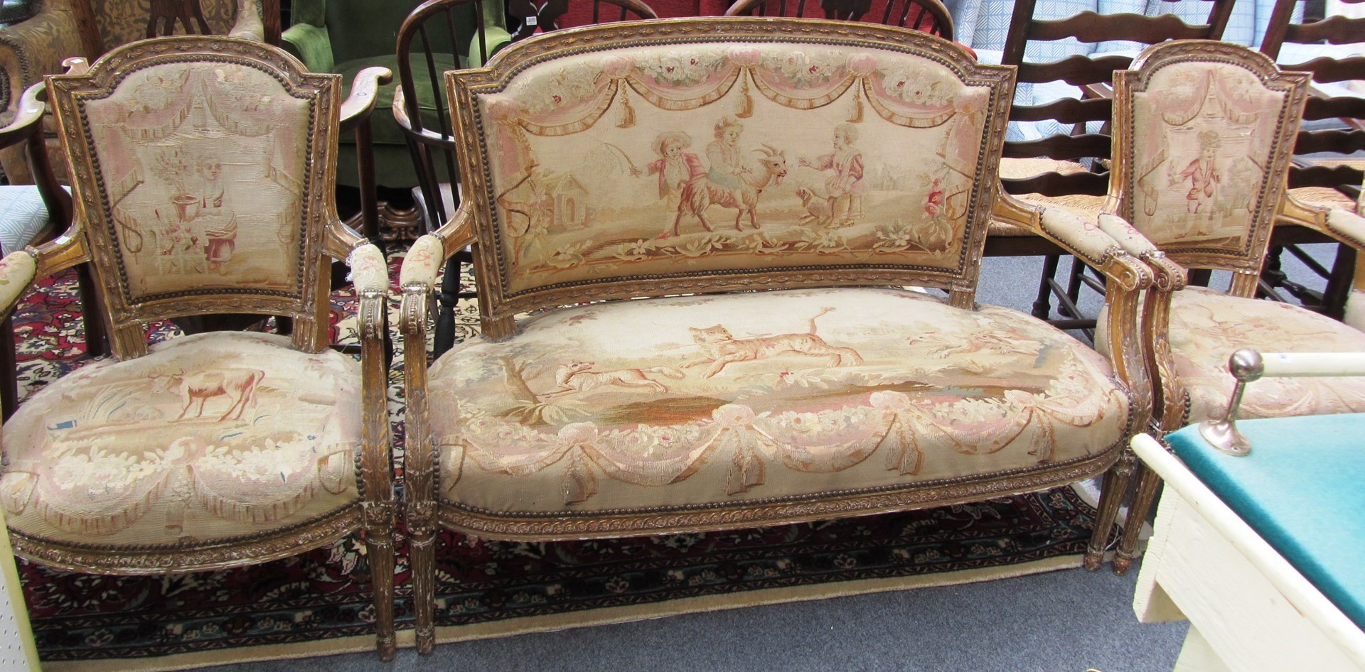 Appraisal: A late th century French giltwood five piece suite of