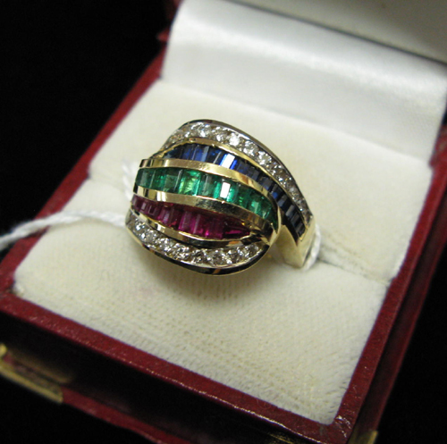 Appraisal: DIAMOND RUBY EMERALD SAPPHIRE AND FOURTEEN KARAT GOLD RING The