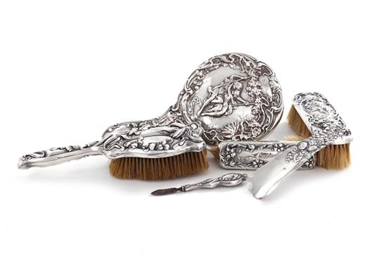 Appraisal: American sterling dressing table implements late th century comprising brushes