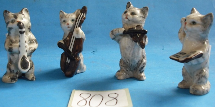 Appraisal: Beswick Cat Orchestra comprising Conductor Violinist Saxophonist and Cello