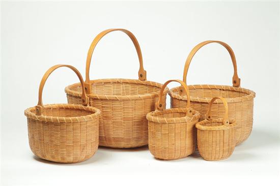 Appraisal: SET OF SIX NESTED BASKETS American th century Nantucket-style baskets