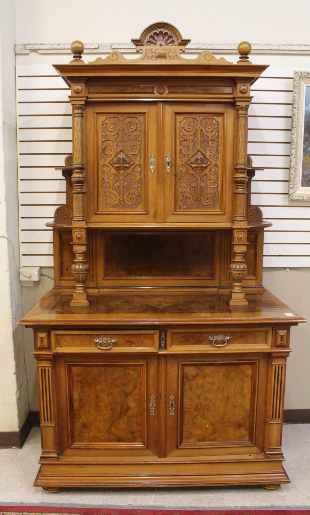 Appraisal: CARVED WALNUT AND BURL WALNUT SIDEBOARD Renaissance Revival style German