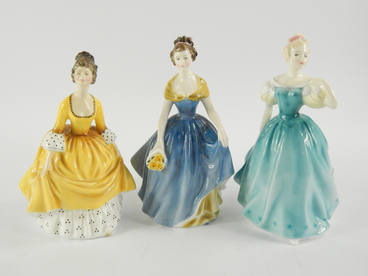 Appraisal: Three Royal Doulton figures comprising Enchantment HN Coralie HN and