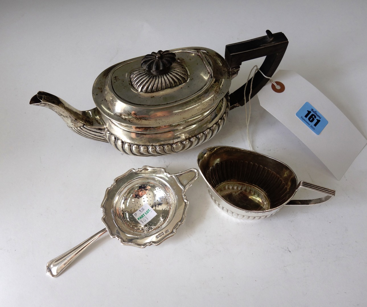 Appraisal: An Edwardian silver bachelor teapot Birmingham in Regency style a