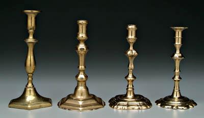 Appraisal: Four th century brass candlesticks one with elongated hexagonal base