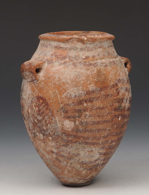 Appraisal: A SMALL PREHISTORIC EGYPTIAN RED WARE TERRACOTTA JAR with line