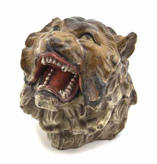 Appraisal: A Cast Metal Inkwell in the form of a roaring