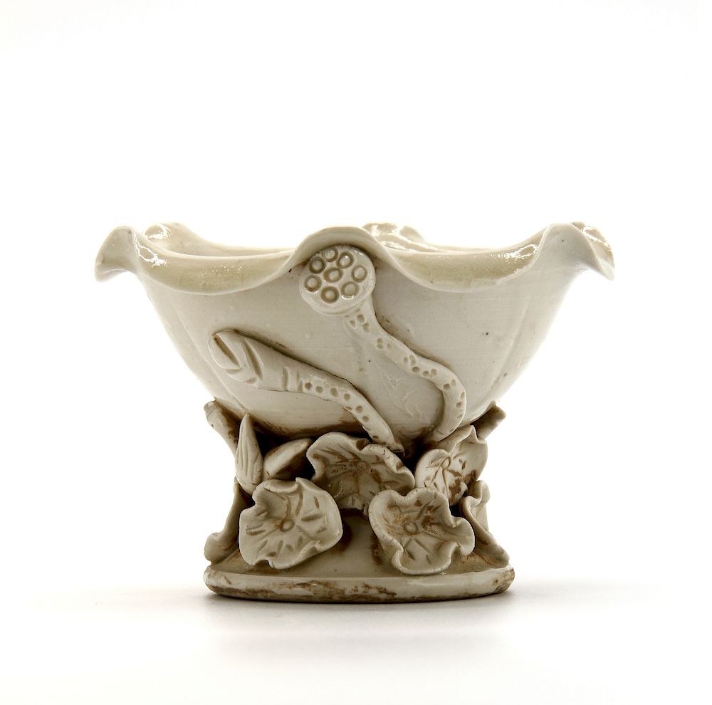 Appraisal: Rare Ting White Glazed Lotus Cup Of deep curved sides