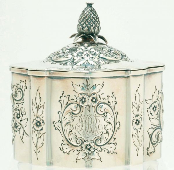 Appraisal: Sterling silver tea caddy Repousse scrolling and floral decoration and