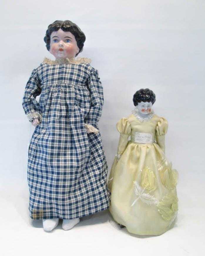 Appraisal: TWO AMERICAN CHINA HEAD DOLLS both with china shoulder heads